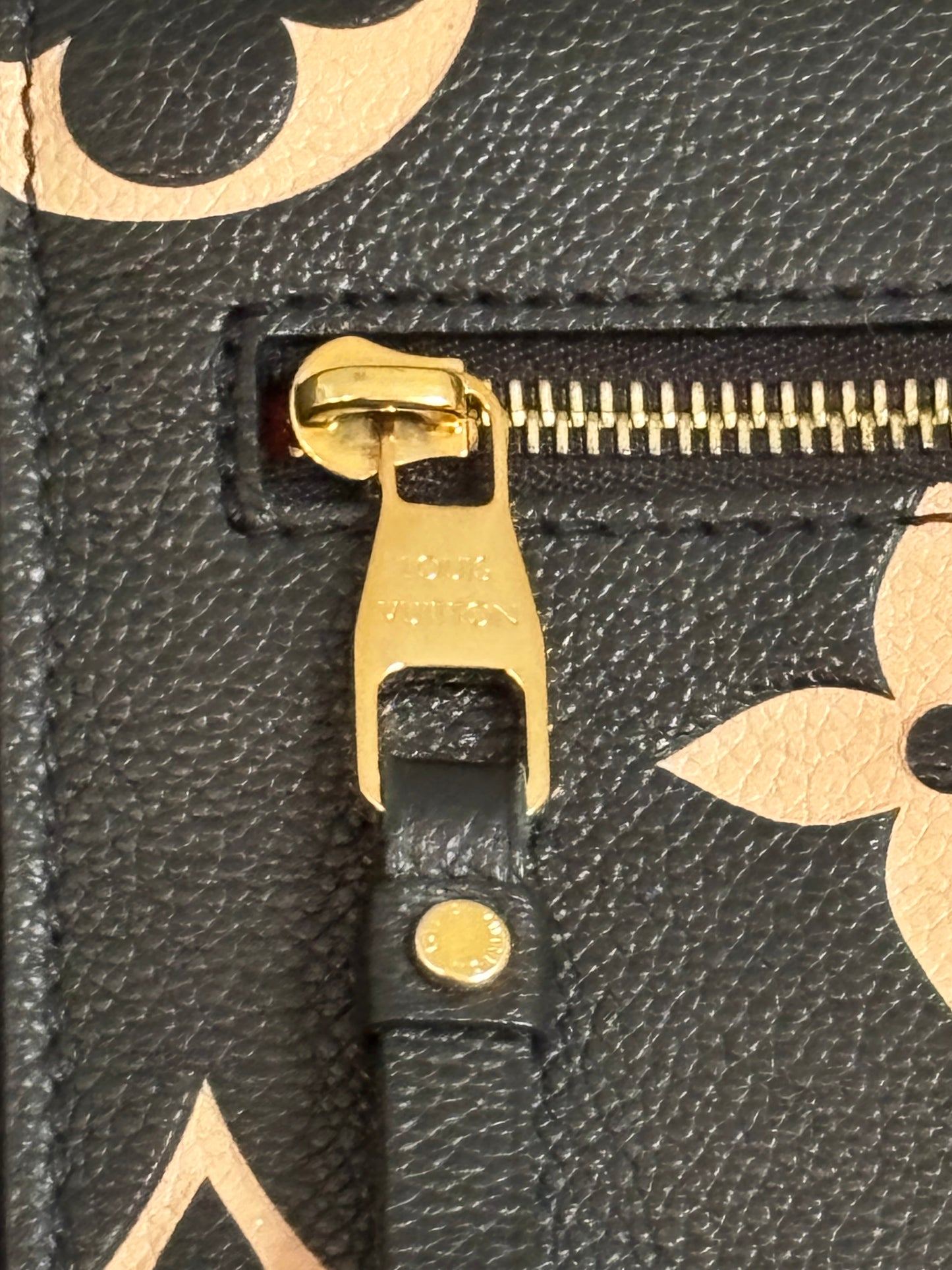 Louis Vuitton Pochette Métis Monogram Giant Empreinte Leather